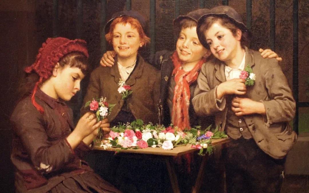 Quatre enfants souriants fabriquent des bouquets de fleurs autour d'une table.